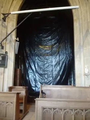 The organ is wrapped in plastic for protection